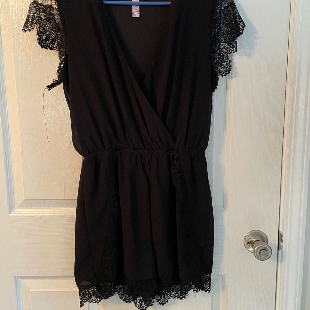 Francesca’s black lace romper